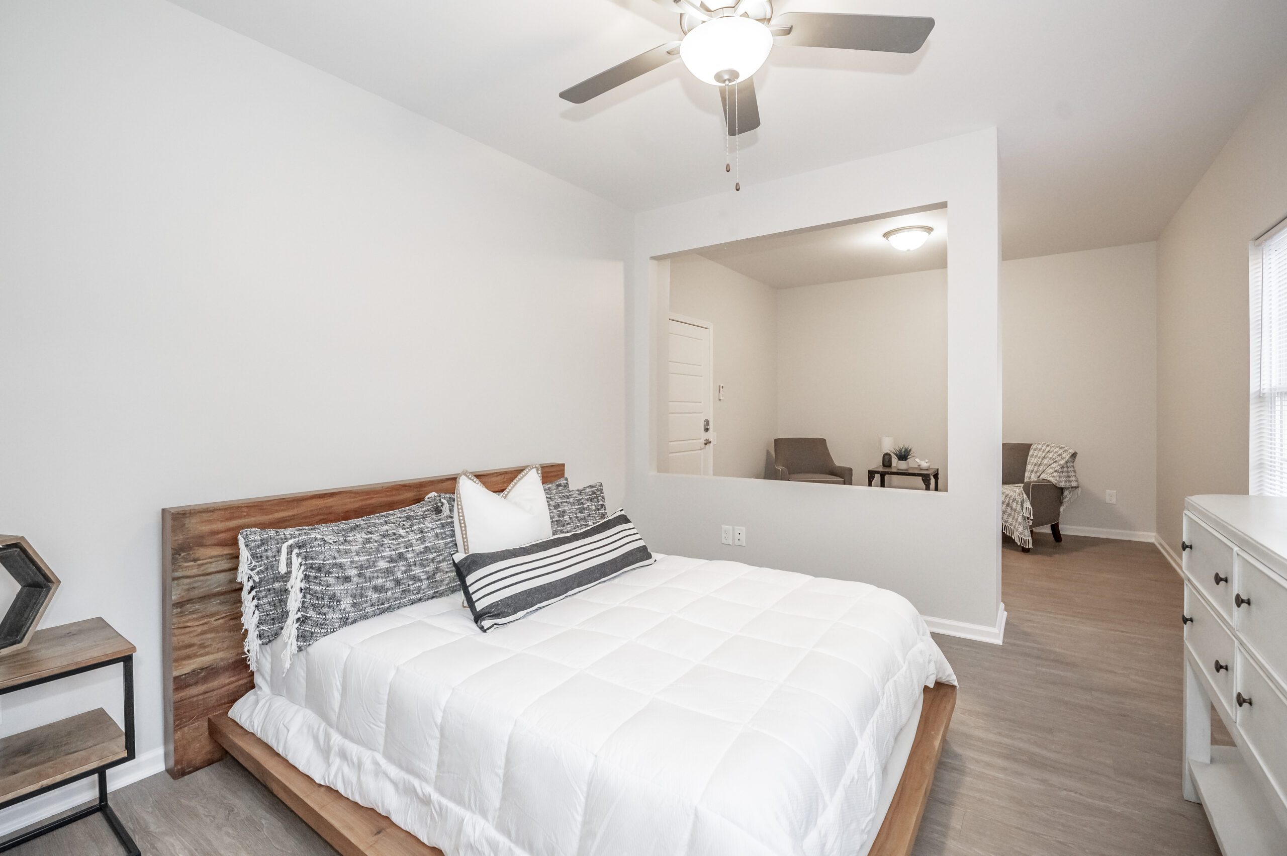 A well-furnished senior living bedroom.
