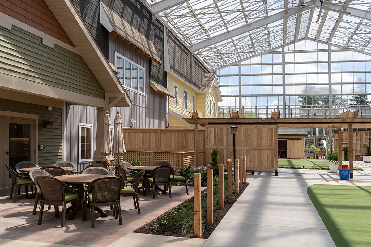 Outdoor courtyard with seating and greenery