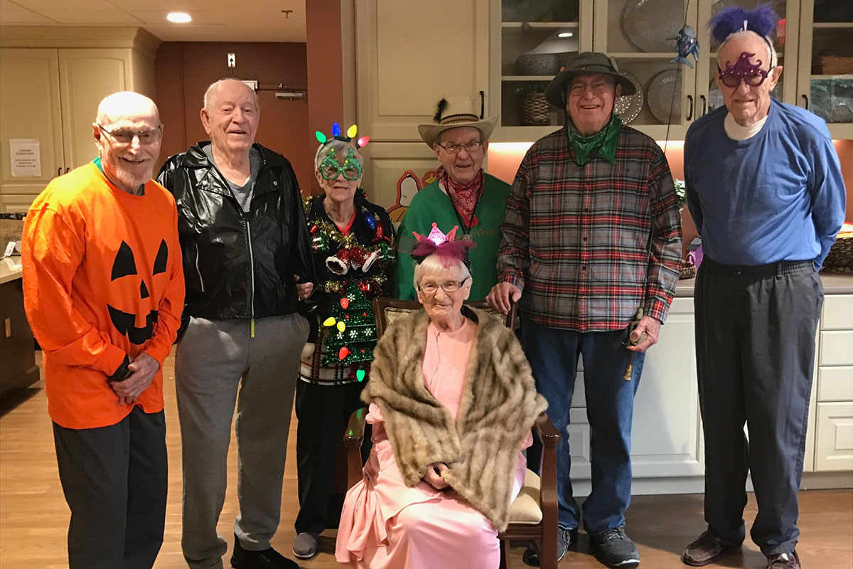 Residents dressed in festive costumes at an event