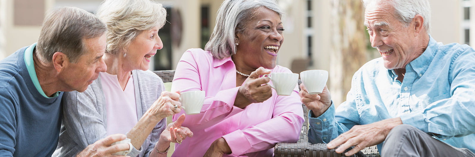 Residents enjoying coffee together in a social setting