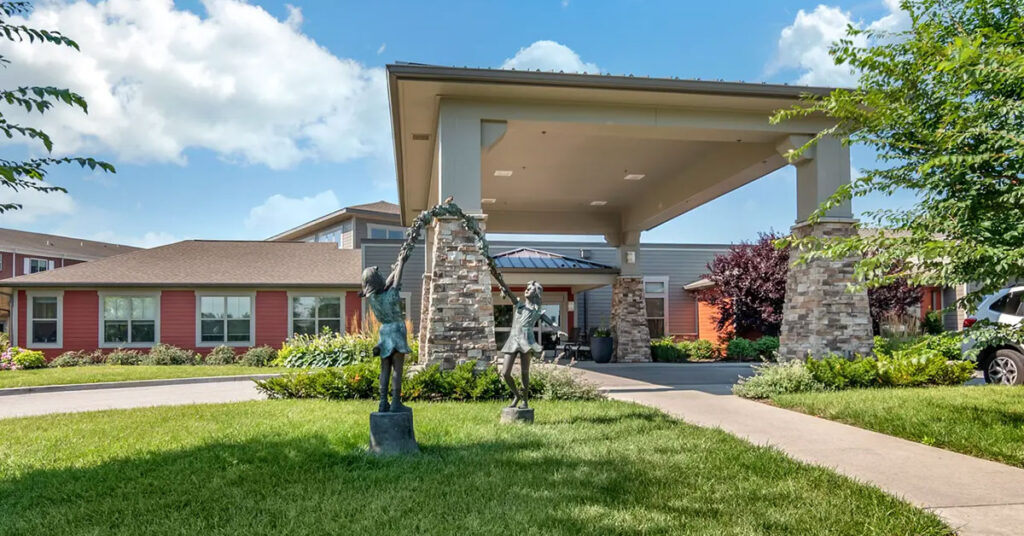 Entrance of Antioch Valley Senior Living with outdoor sculptures