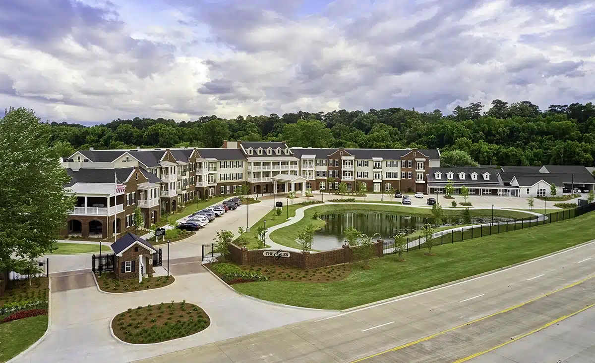 Aerial view of The Glen Retirement System with gardens and buildings