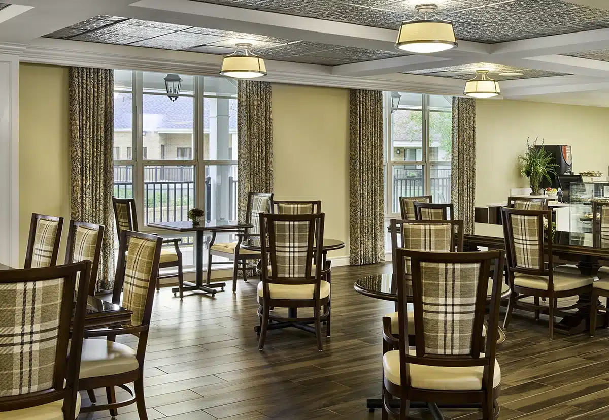 Bright common area with seating and windows