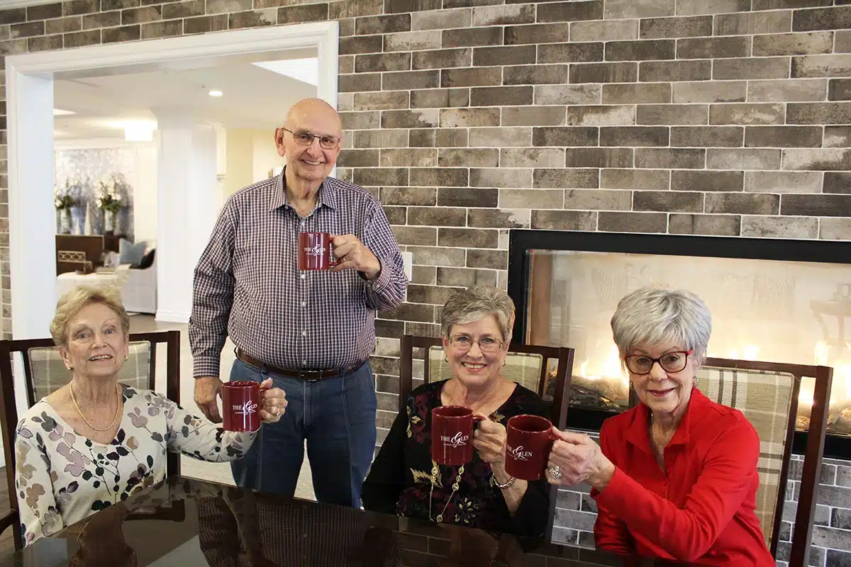 Residents enjoying drinks in a common area