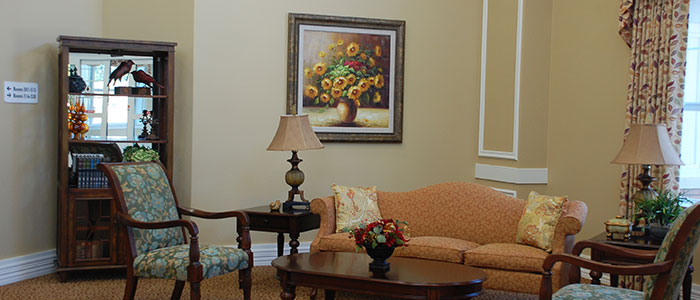 Cozy common area with seating and artwork