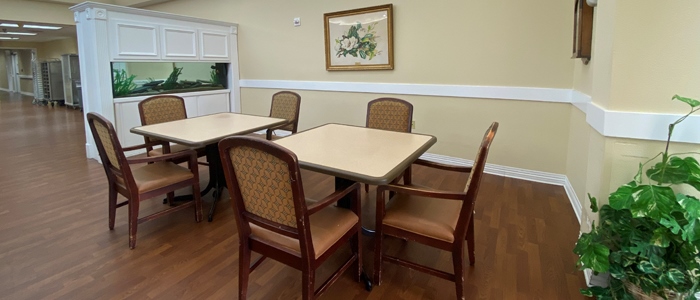 Spacious dining area with tables and chairs