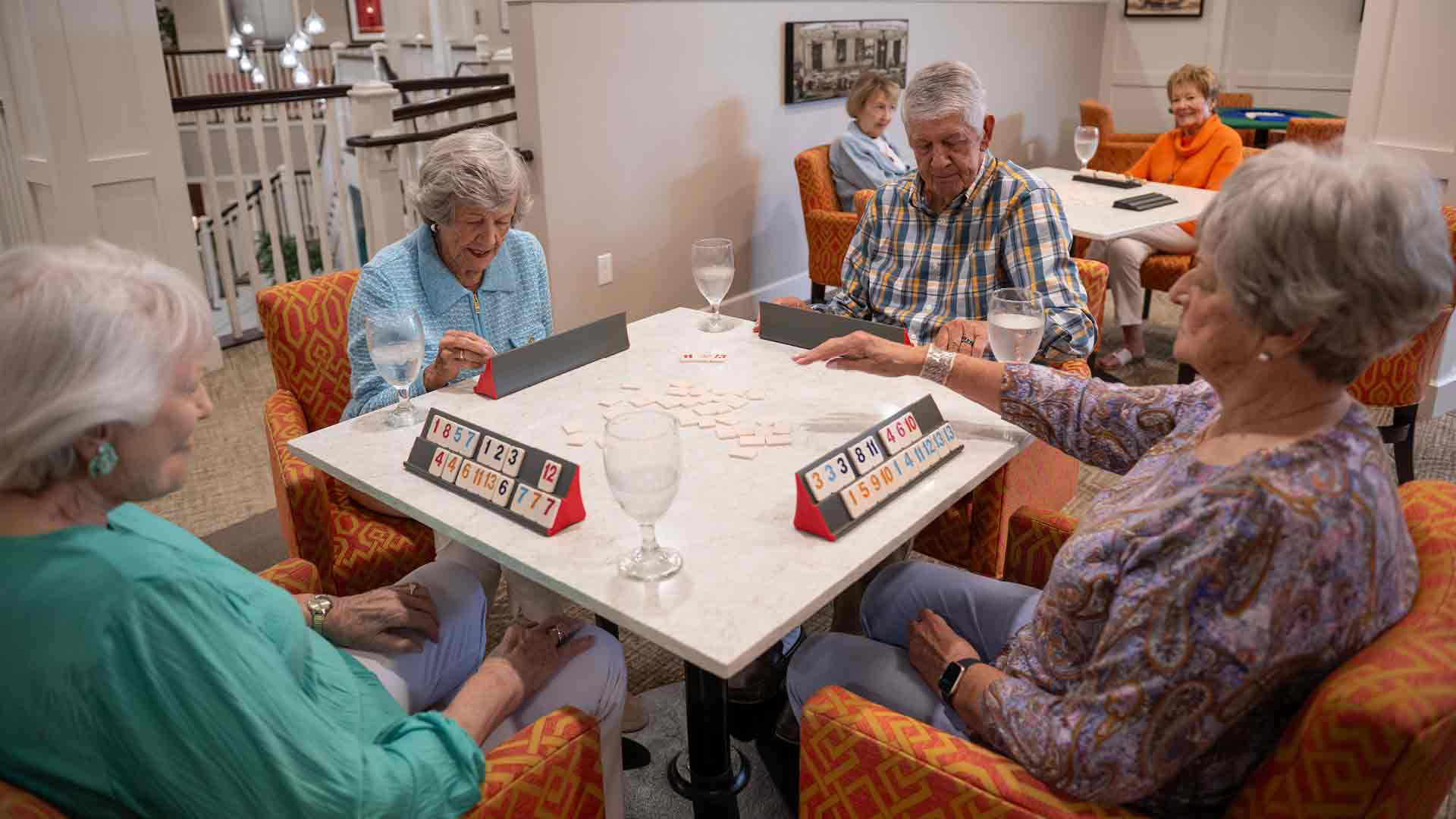 Residents playing a game together in a common area
