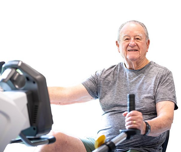 Senior man exercising on a rowing machine