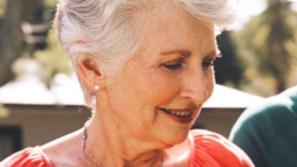 Elderly woman enjoying time outdoors