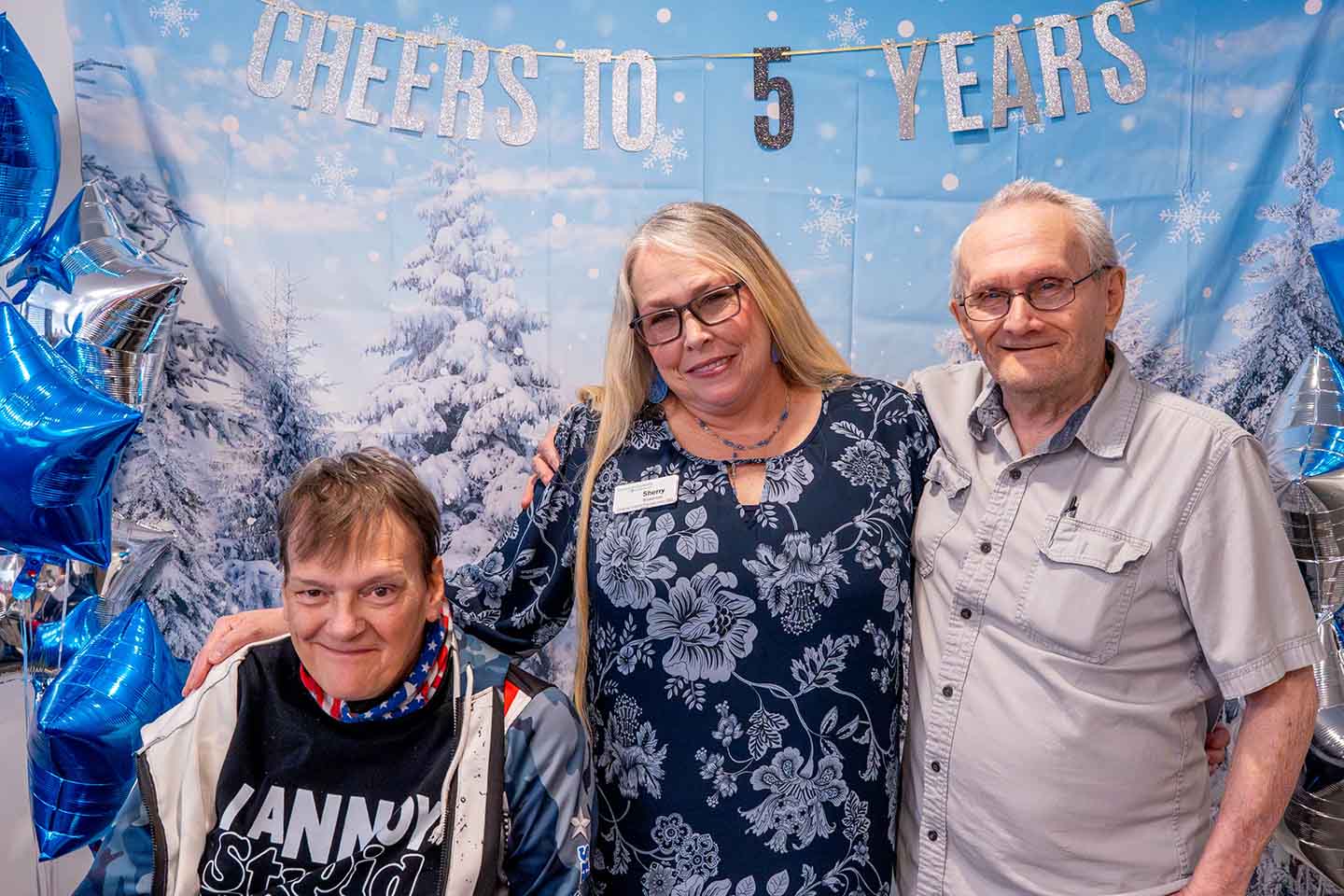Residents and staff celebrating an anniversary together.