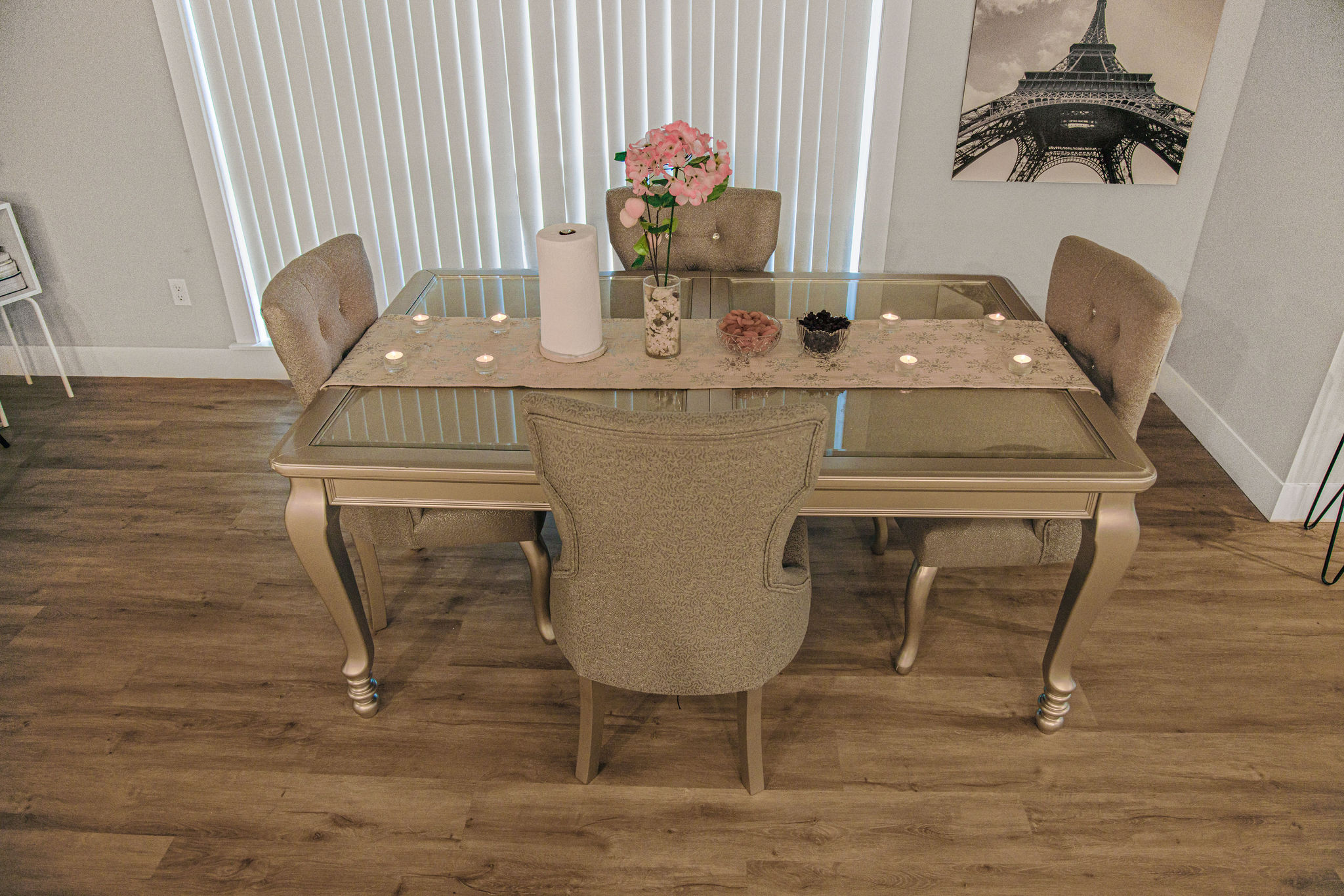 Dining table set with flowers and decorations.