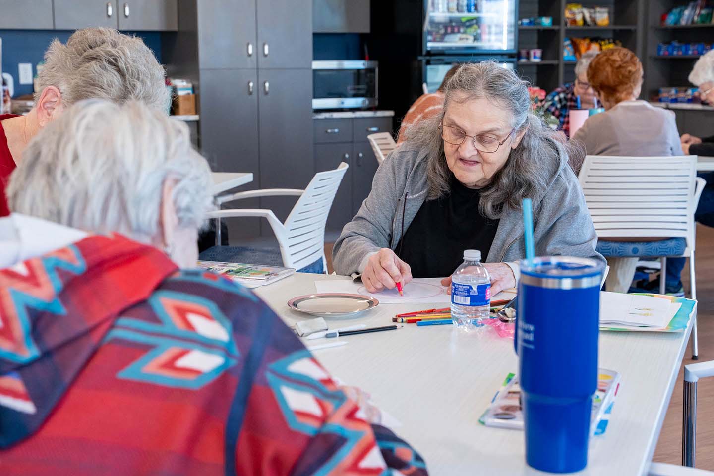 Residents engaged in an art activity