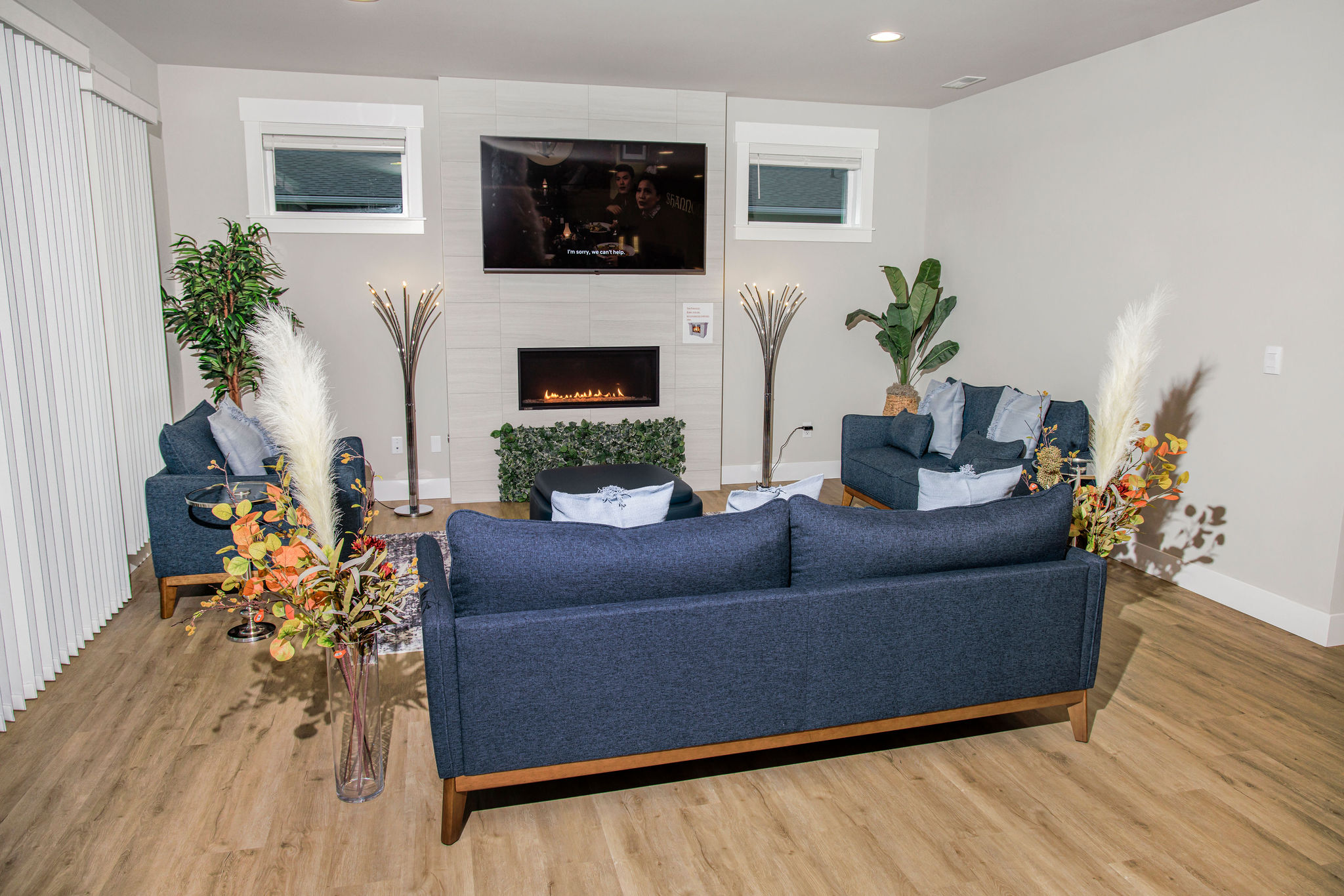 Cozy lounge area with modern furniture and decor.