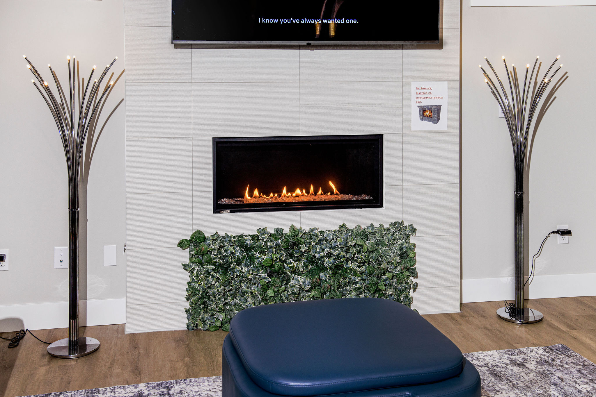 Cozy interior with a modern fireplace feature.