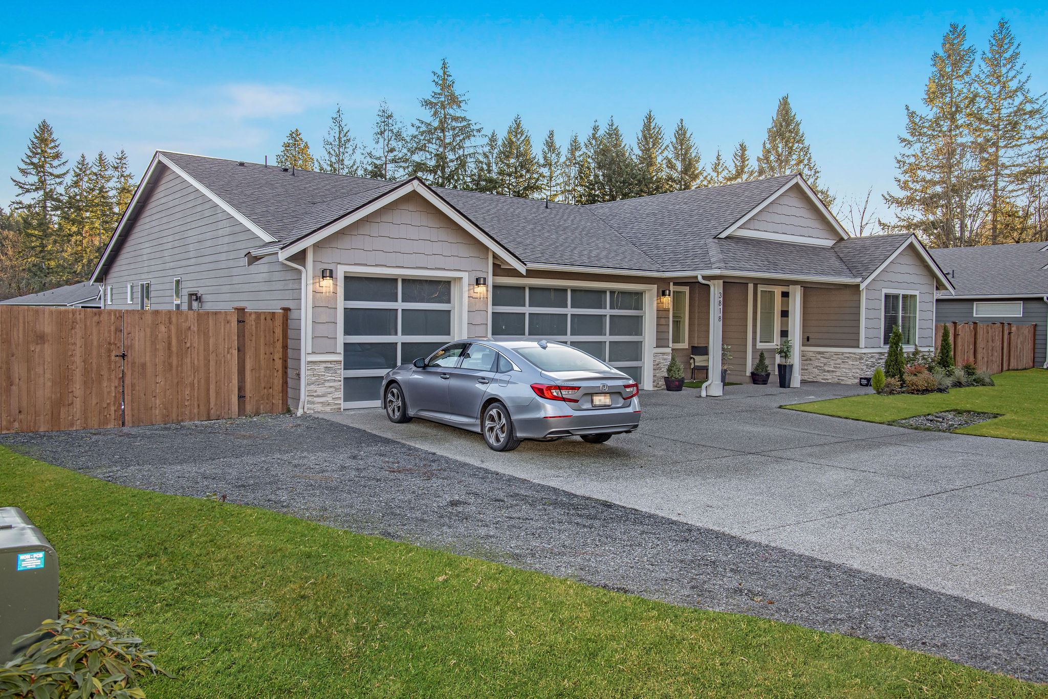Exterior view of a residential building with a car