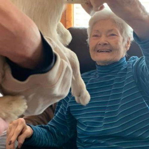 Senior woman enjoying time with a pet