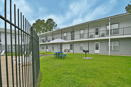 Outdoor area with tables and chairs at the facility