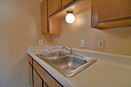 Kitchen sink area in an apartment
