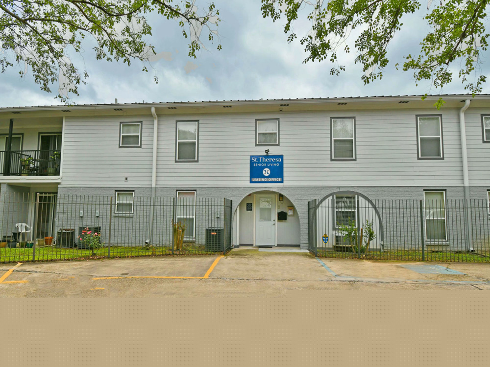 Exterior view of St. Theresa's Apartments building.