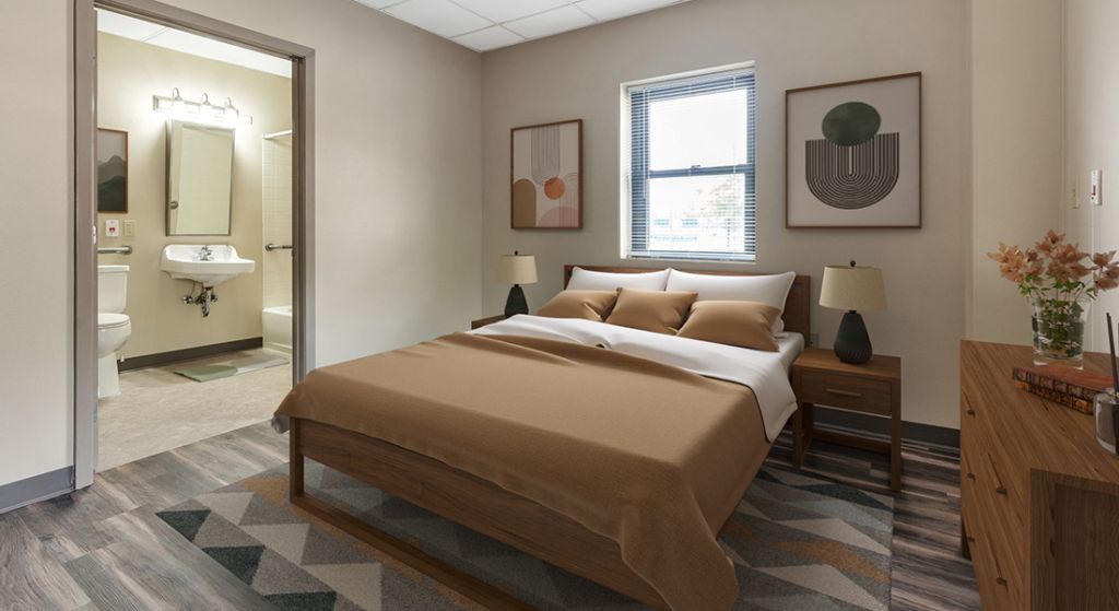 Modern bedroom with decor in a senior living apartment