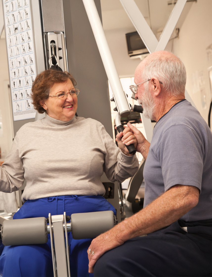 Resident exercising with staff assistance