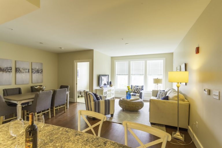 Bright common area with seating and decor