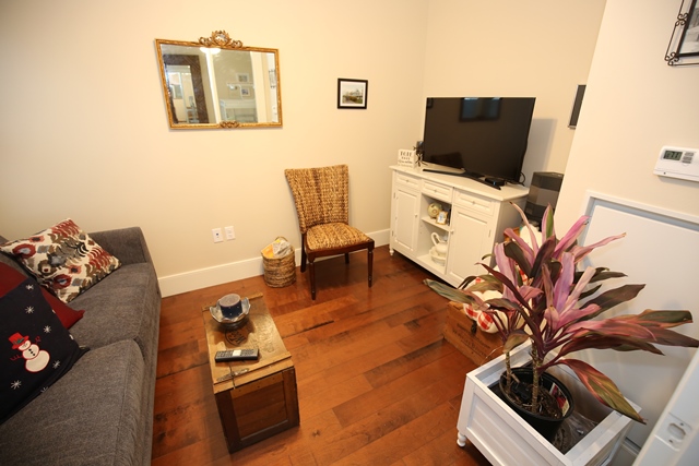 Cozy lounge area with a TV and seating