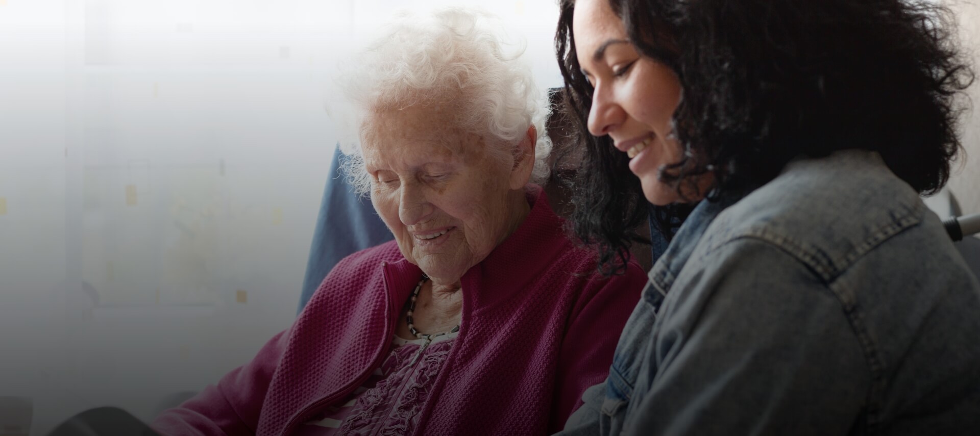 Resident and staff member sharing a moment.