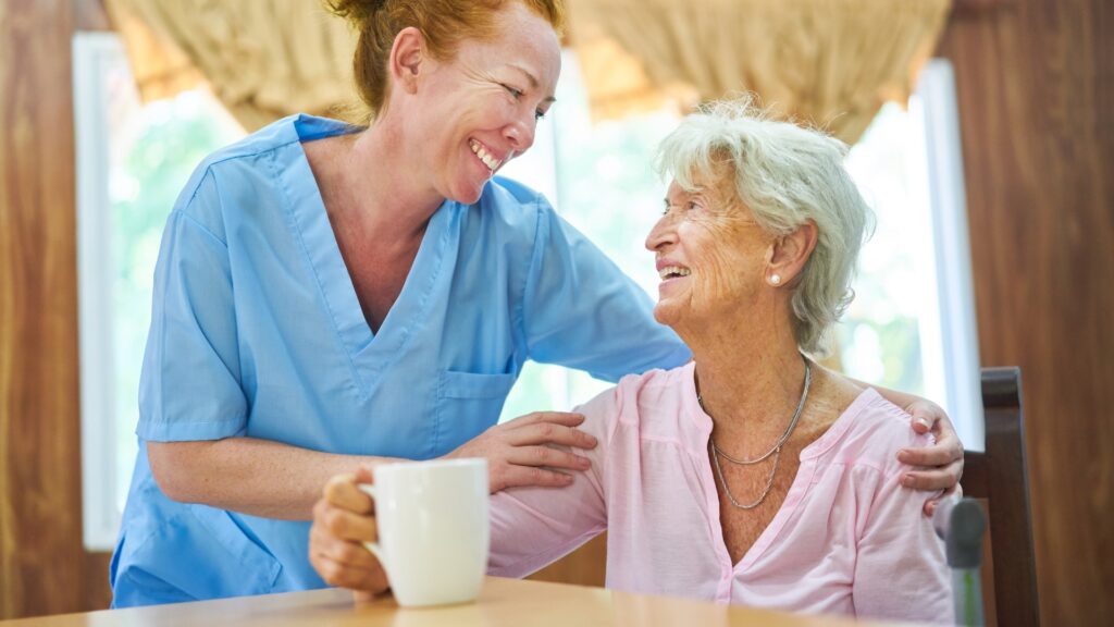Caregiver interacting with a senior resident