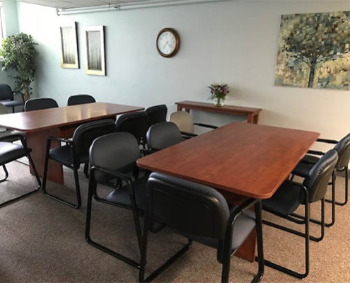 Meeting room with tables and chairs