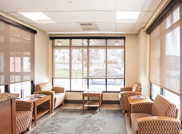 Common area with seating and large windows