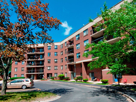 Exterior view of McKinley House with landscaped grounds.