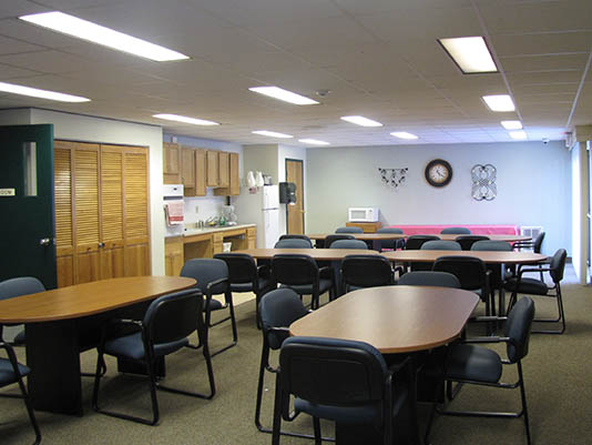 Interior common area with tables and chairs