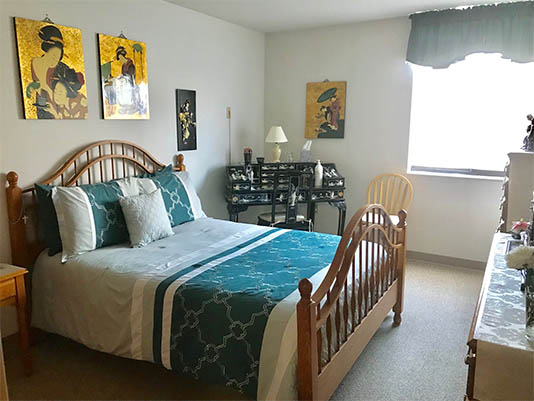Cozy bedroom with art on the walls