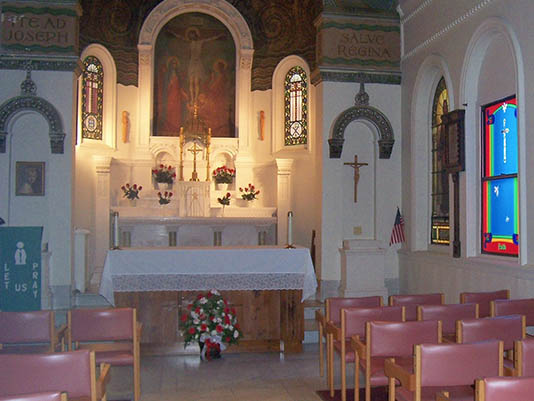 Interior view of a chapel with an altar