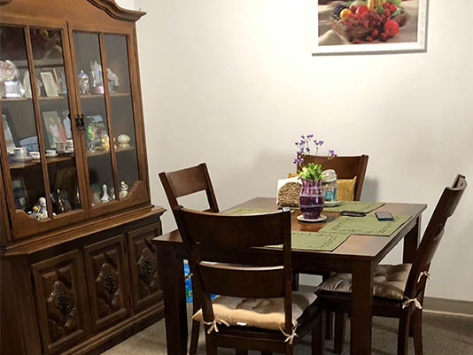Dining area with wooden furniture and decor