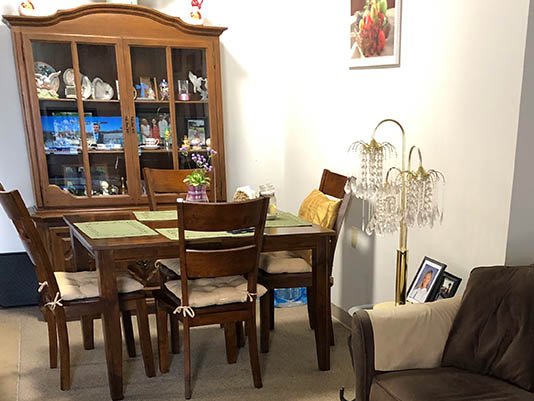 Dining area with wooden table and chairs