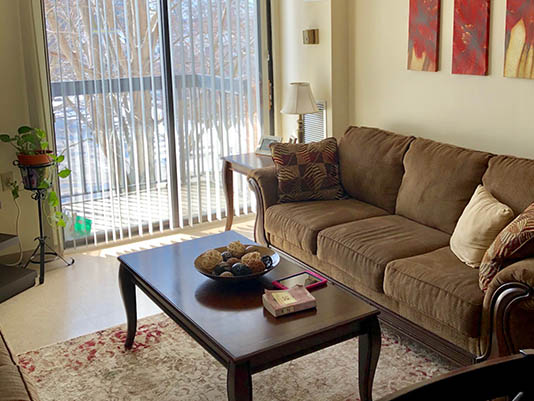Cozy common area with a couch and decor.