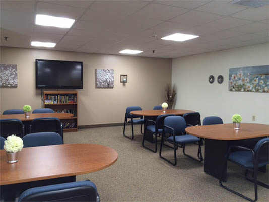 Common area with tables and chairs