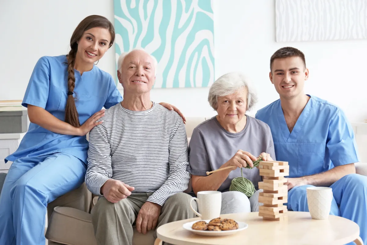 Residents and staff engaging in an activity.