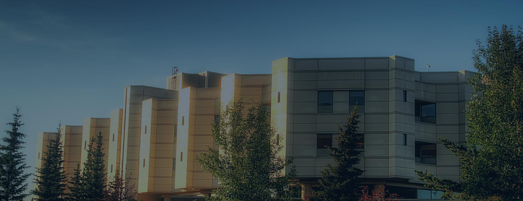 Exterior view of a modern care facility building.
