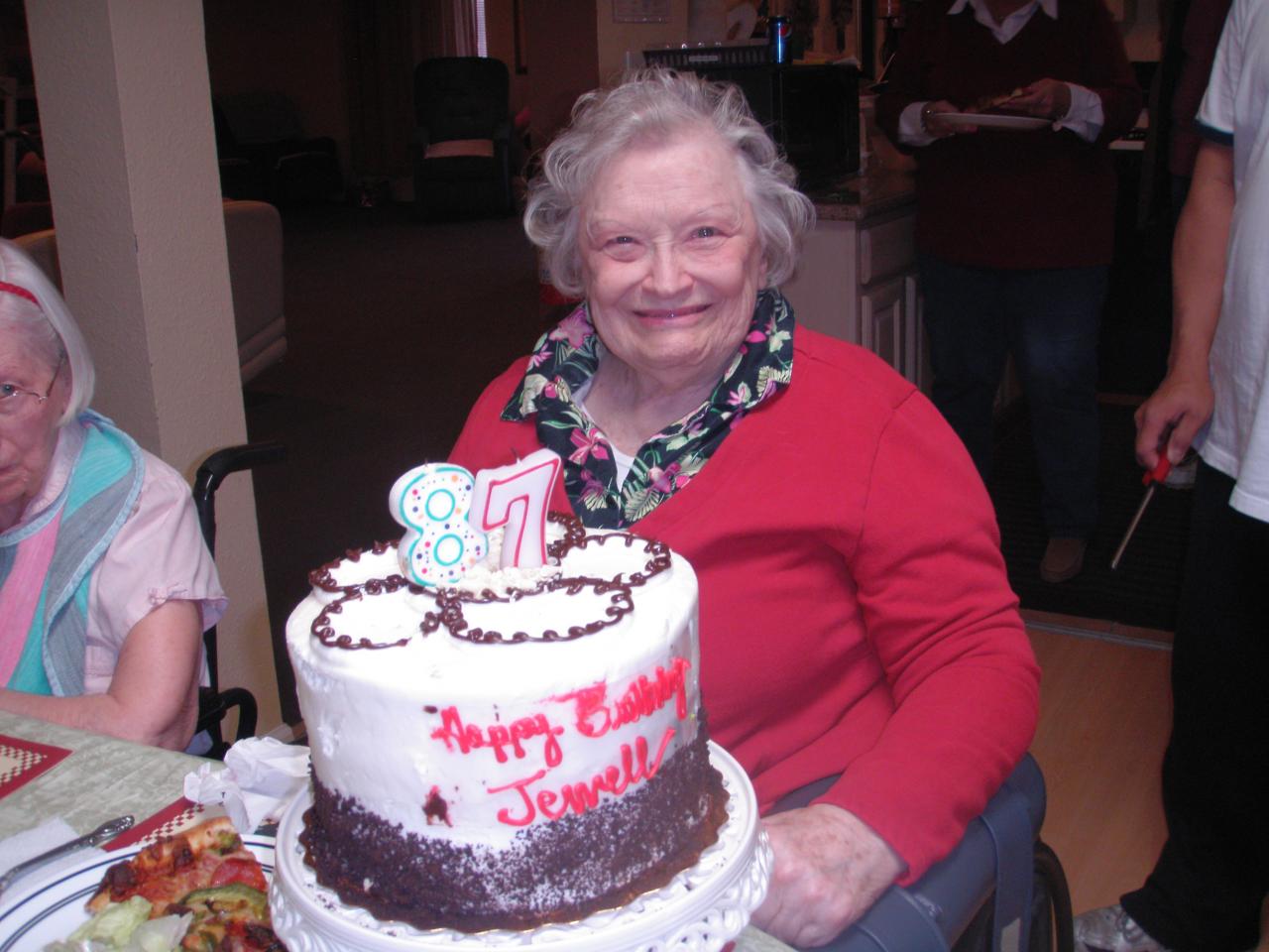 Resident celebrating birthday with cake