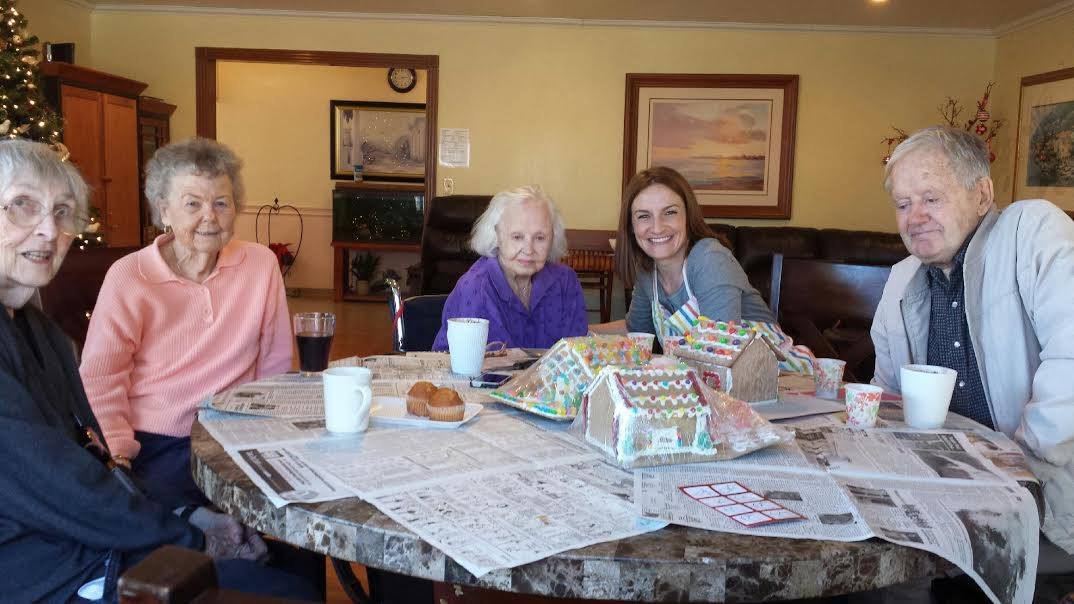 Residents and staff enjoying an activity together.