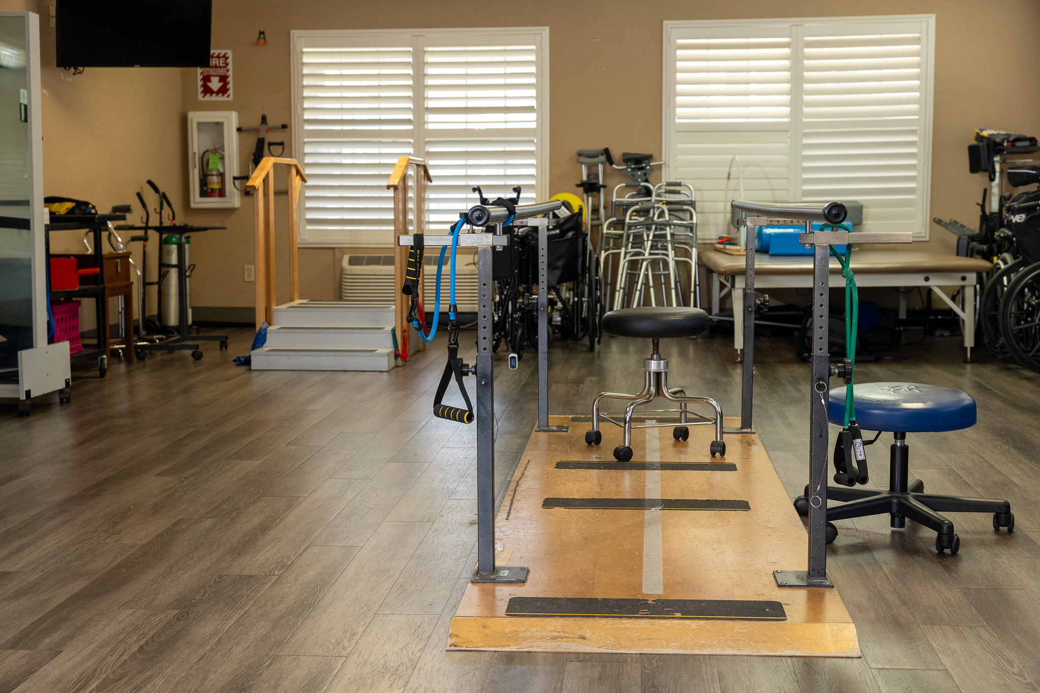 Rehabilitation area with equipment in a therapy room