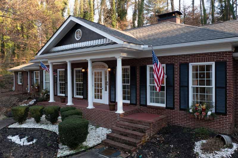 Exterior view of the facility with flag decor