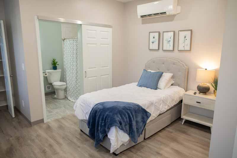 Cozy resident room with bed and en-suite bathroom