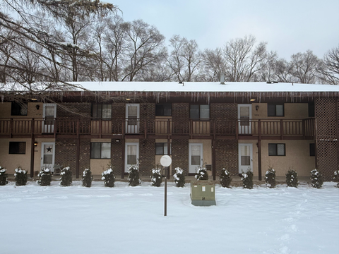 Exterior view of a residential building in winter.