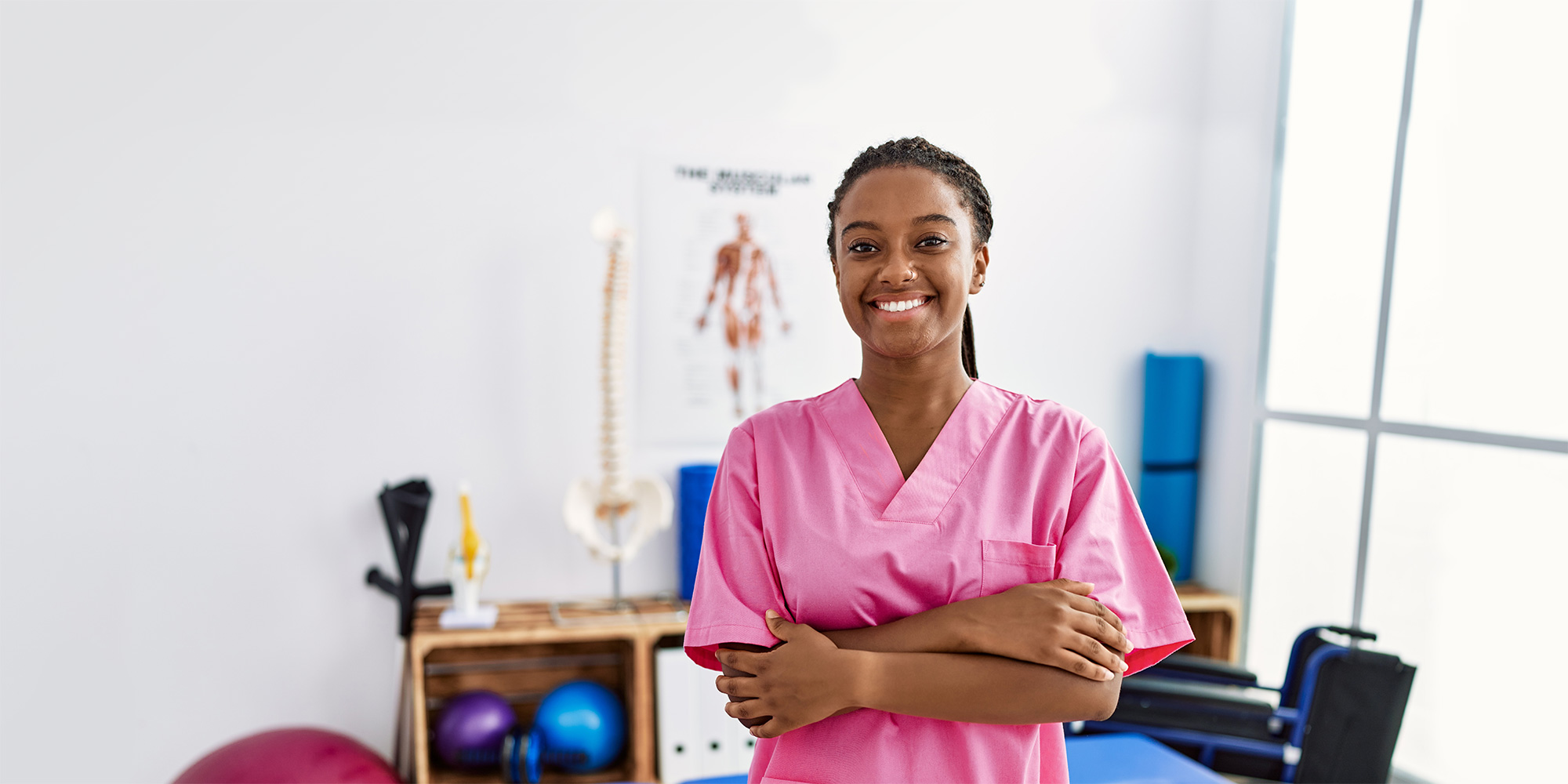 Staff member smiling in a therapy room