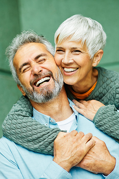 Happy senior couple laughing together