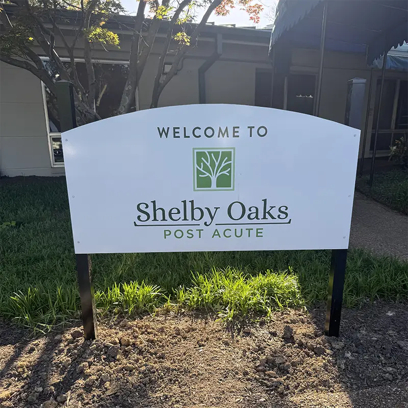 Welcome sign for Shelby Oaks Post Acute
